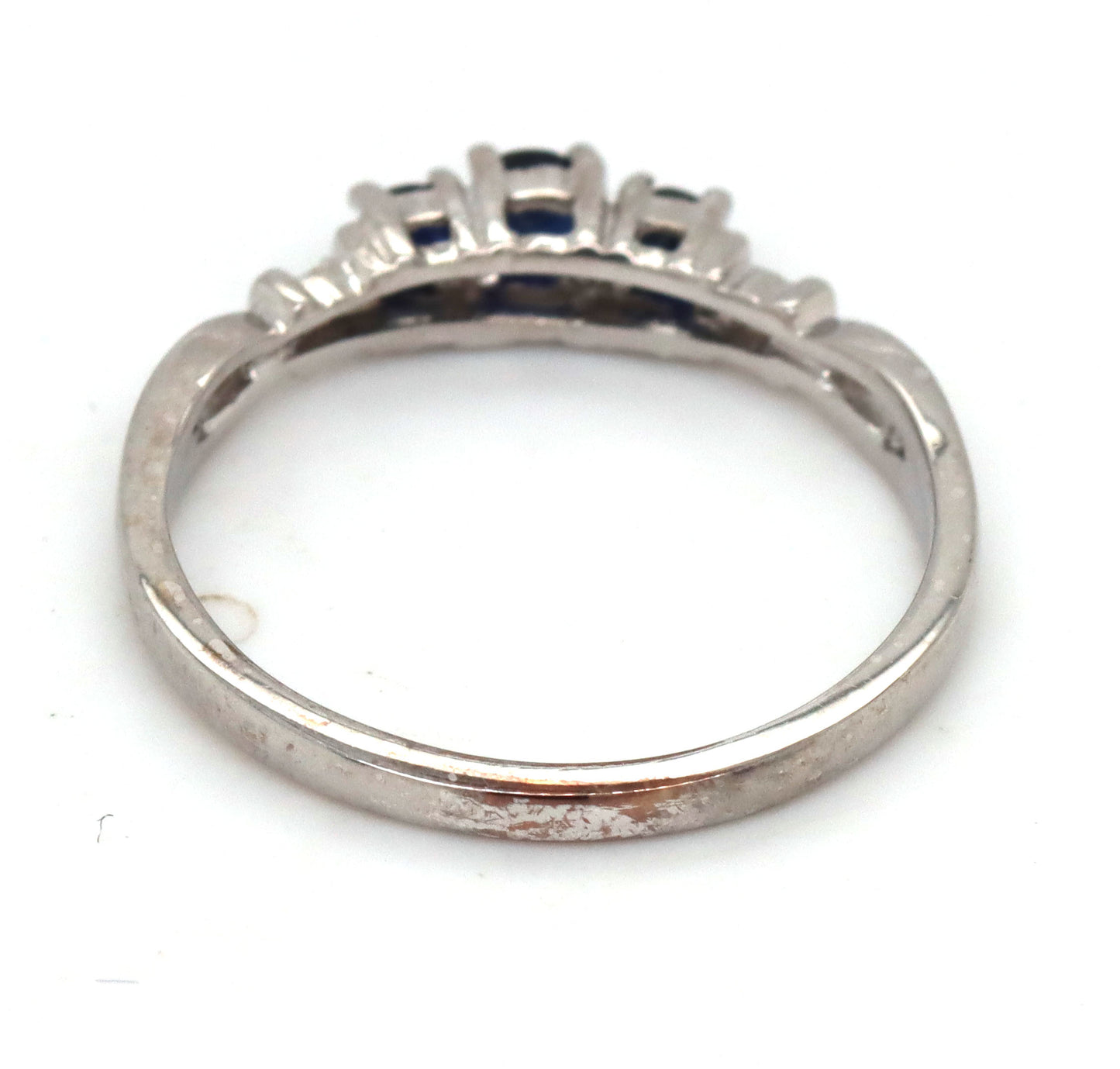 10kt White gold 3 stone sapphire and diamond accent ring