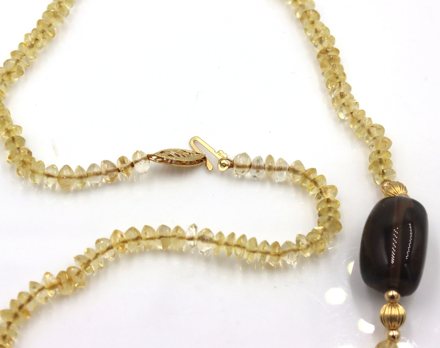 Smokey quartz pendant on citirne beaded necklace with 14kt yellow gold clasp