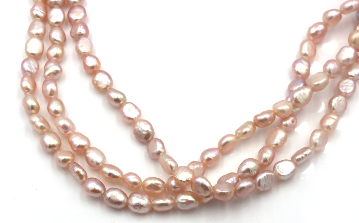 Pearl square pendant on multi strand pearl necklace