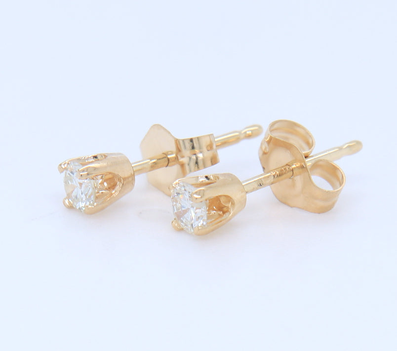 Dazzling approximate 1/15ctw Round Brilliant Cut Diamond Stud Earrings