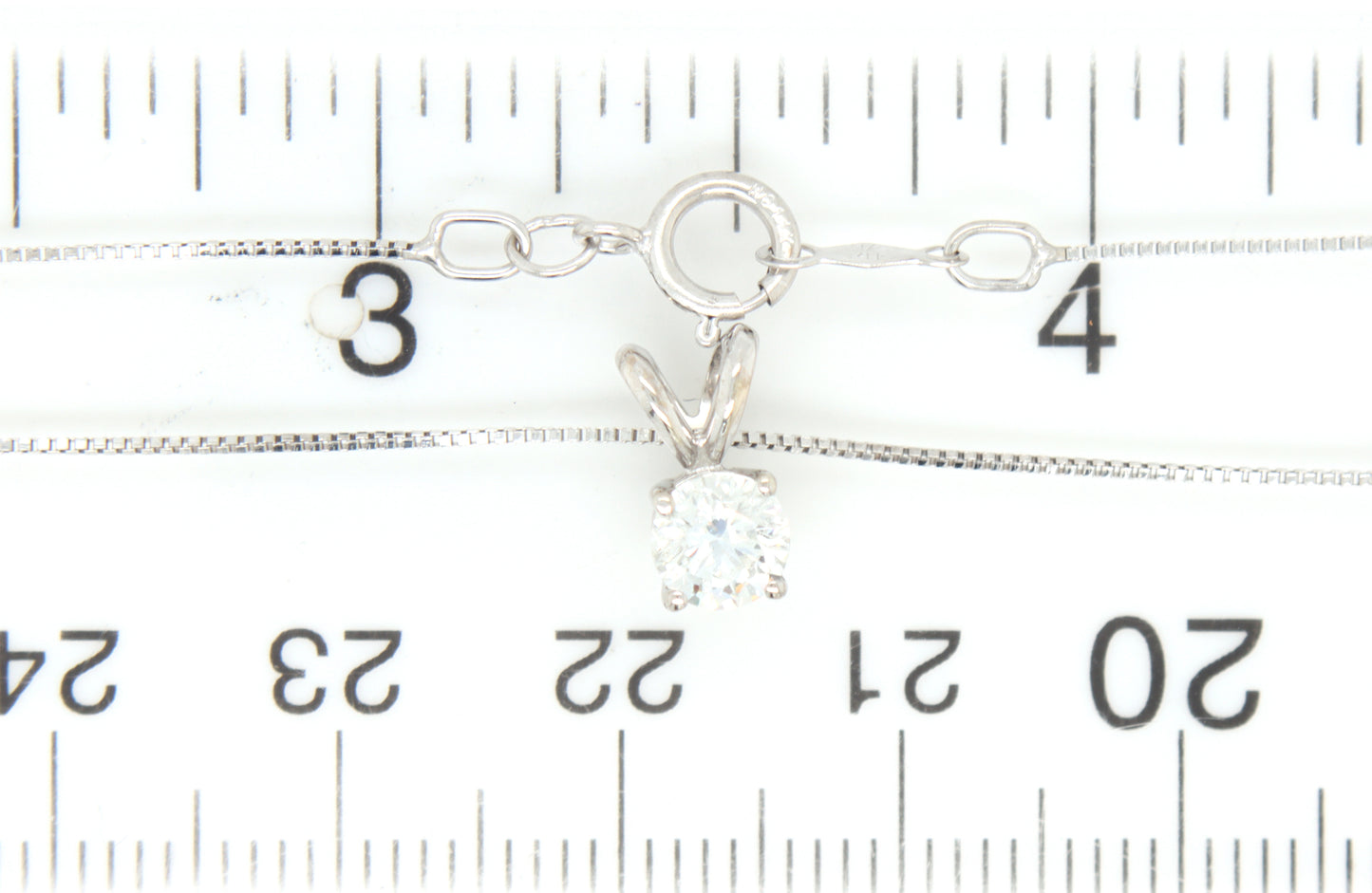 14kt White gold diamond solitaire pendant on chain