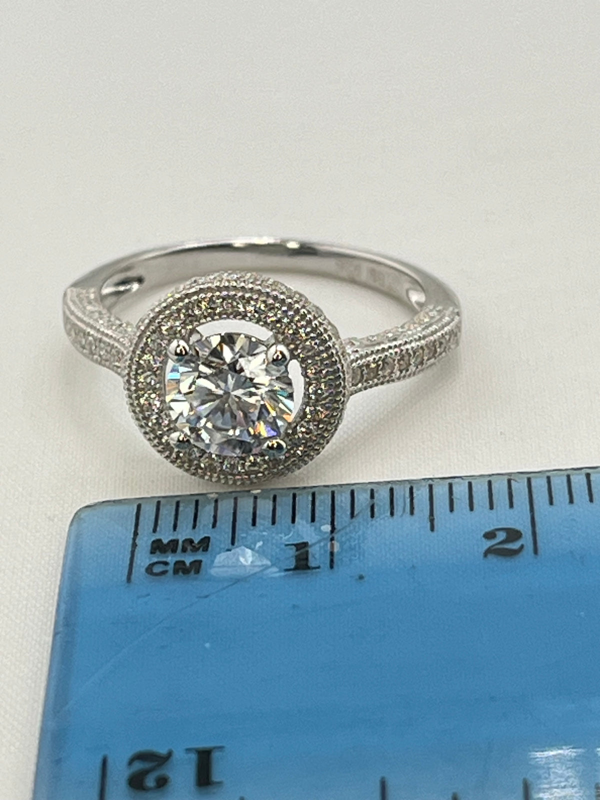 925 Sterling Silver TW One Carat Brilliant Cut Moissanite Halo Engagement Ring