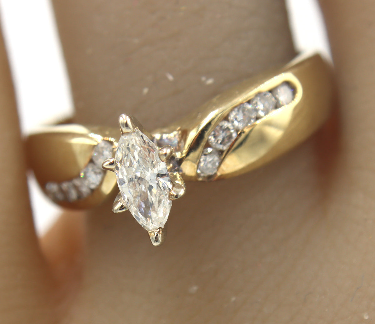 14kt Yellow Gold approximate 0.25ct Marquise Diamond Engagement Ring