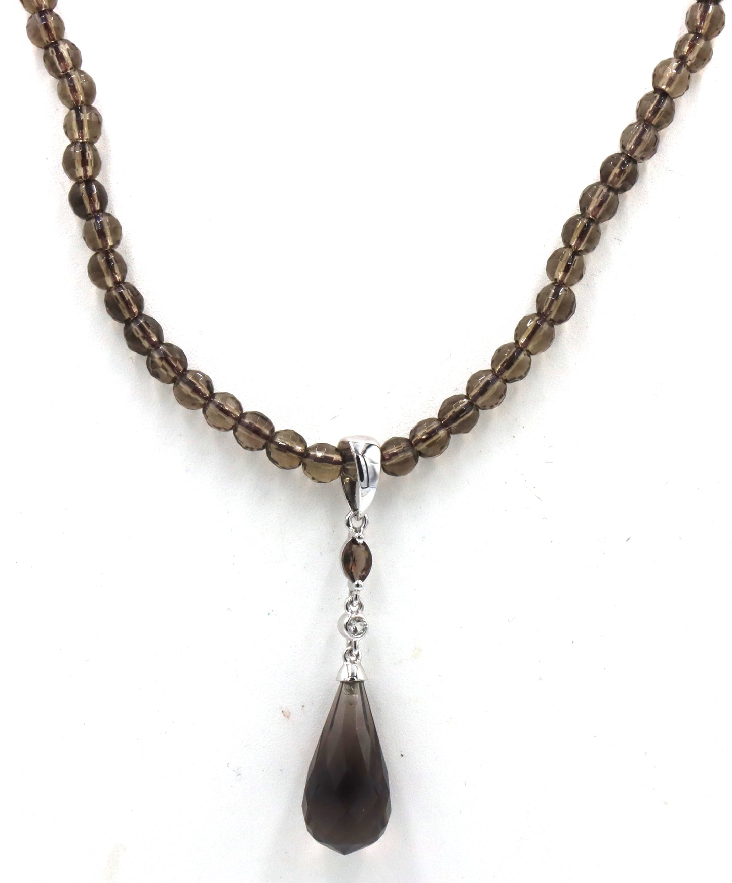 Pear shaped smokey quartz pendant on beaded necklace