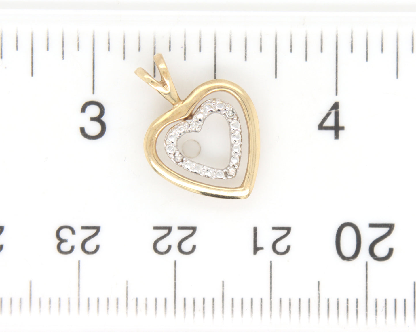 10kt two tone double heart shaped diamond pendant