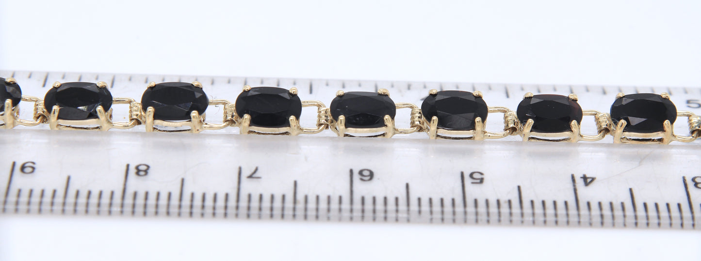 10kt Yellow gold oval black onyx tennis bracelet