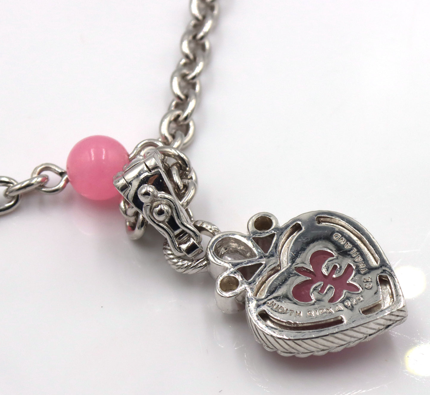 Judith Ripka pink chain necklace with pink heart enhancer