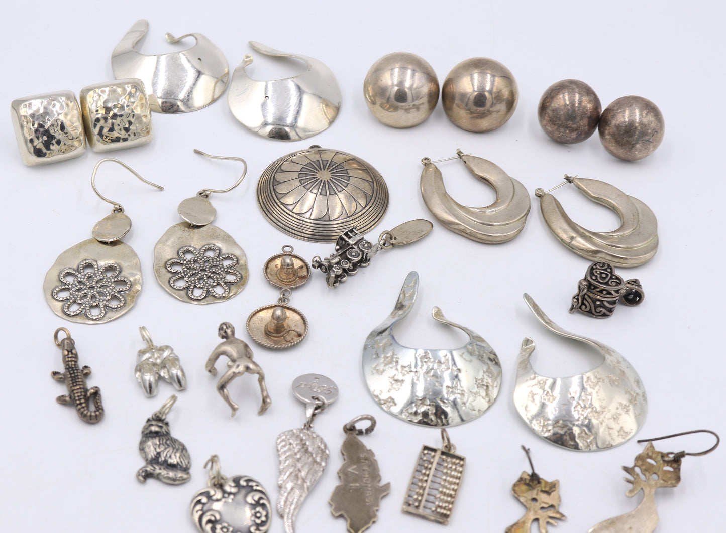 Group lot of Vintage 925 sterling silver charms and earrings