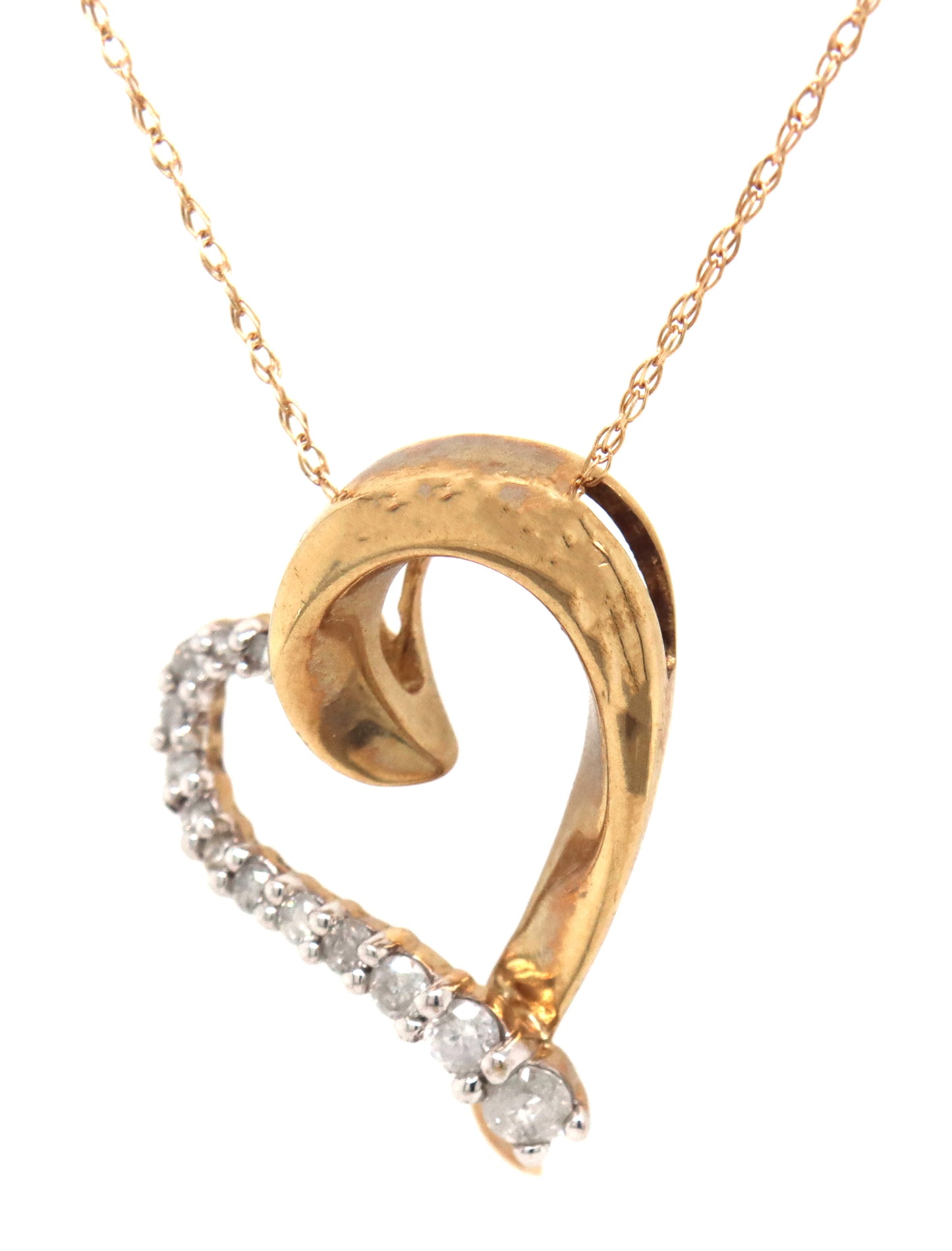 10kt Yellow gold diamond heart shaped pendant on chain