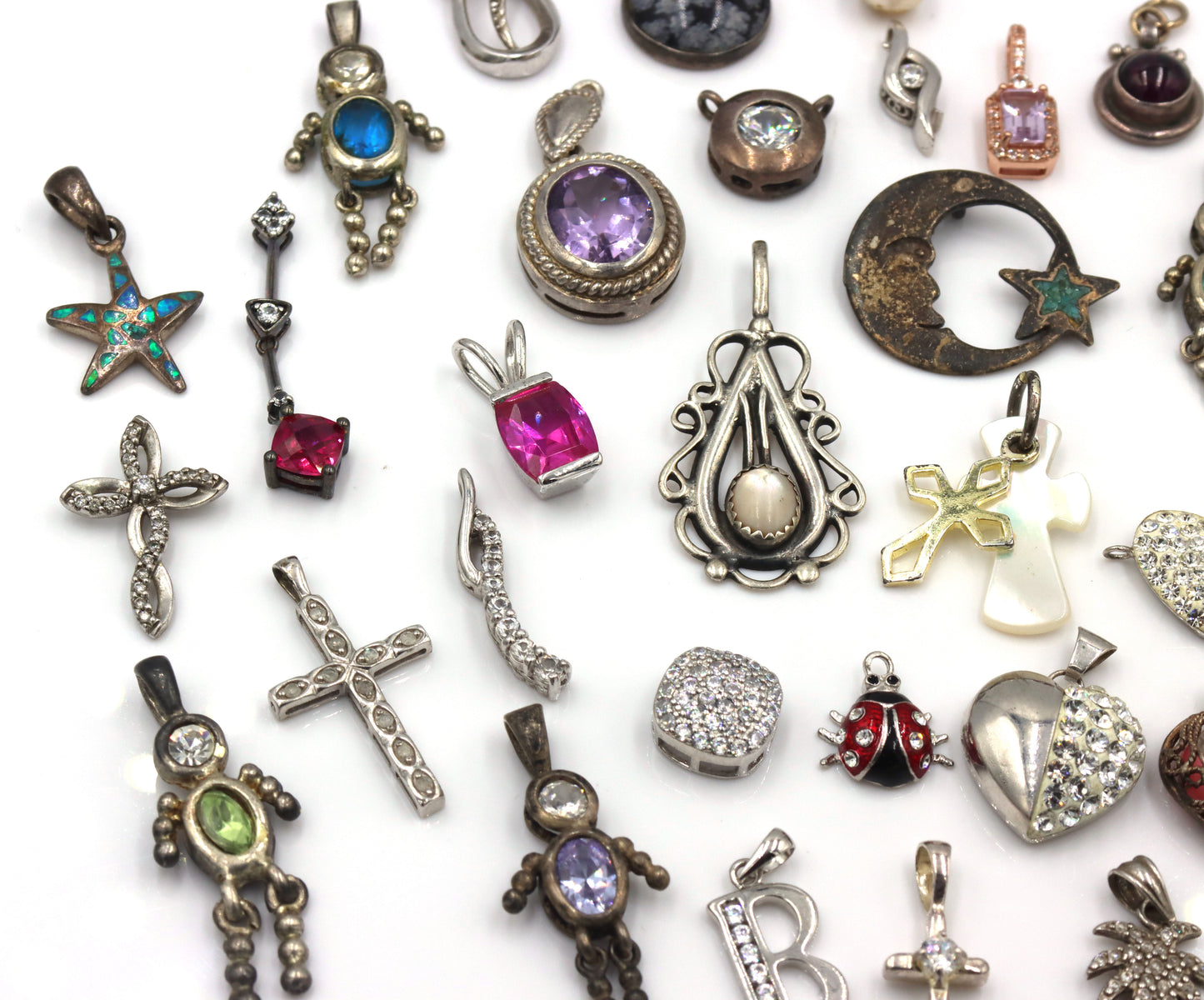 Lot of vintage 925 sterling silver pendants and charms