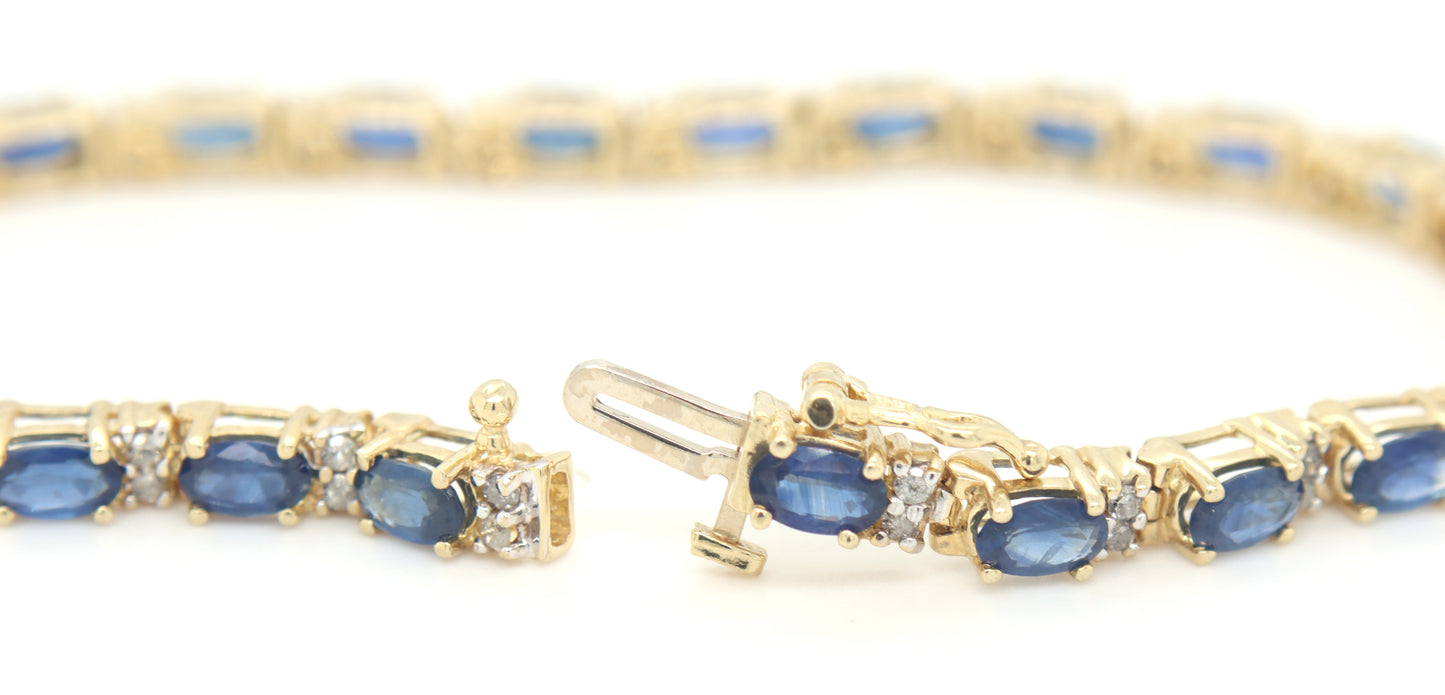 14kt Yellow gold blue sapphire and diamond tennis bracelet
