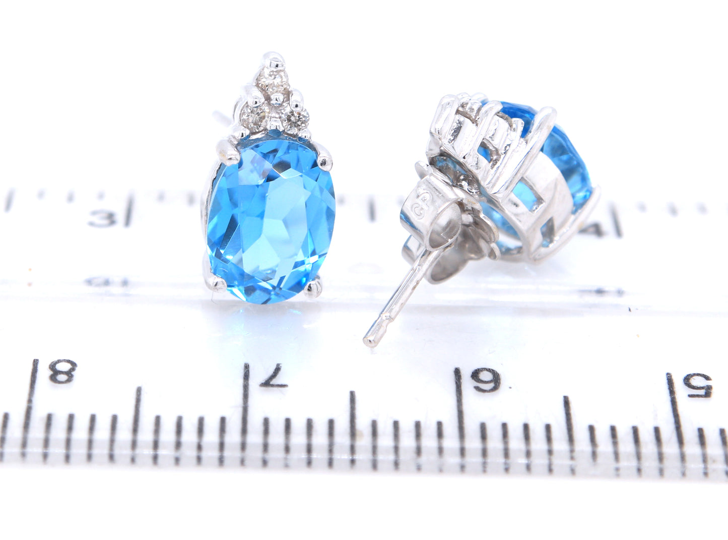 14kt White gold 3.60ctw Blue topaz and diamond accent earrings