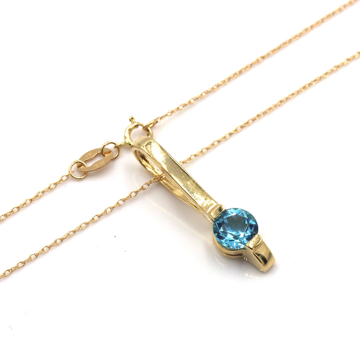 14kt Yellow gold blue topaz bar pendant on chain