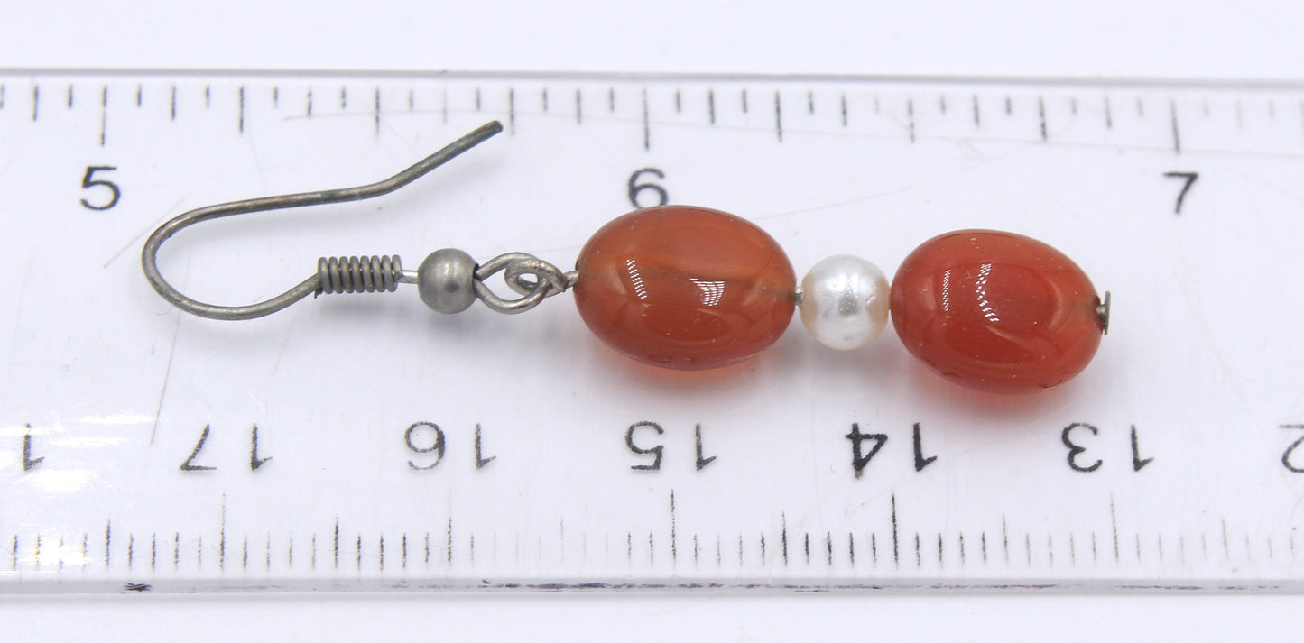 Set of multi row pearl and red agate necklace with matching bracelet and dangle earrings