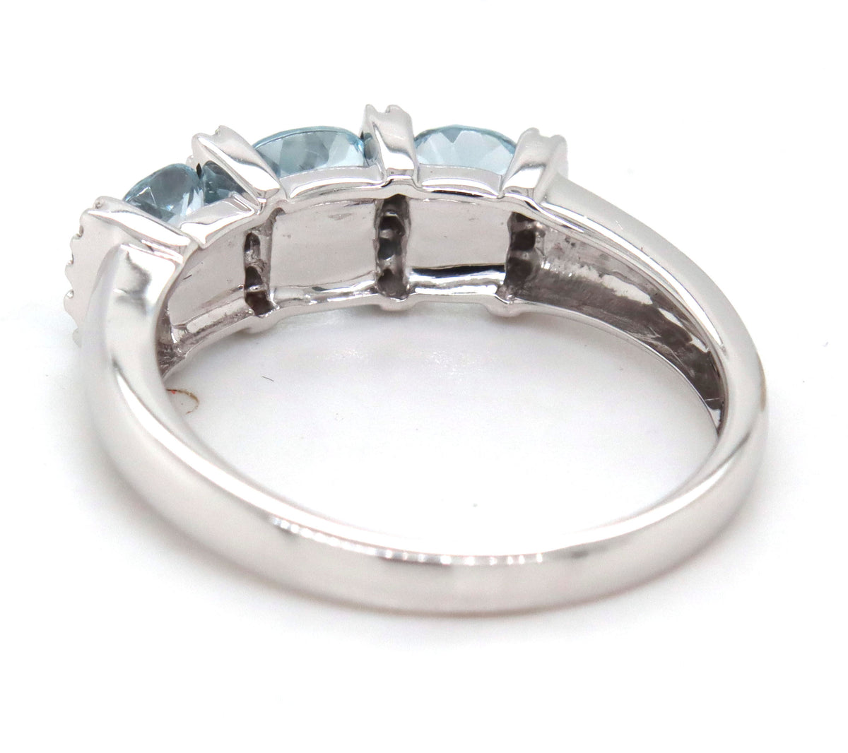14kt White gold blue topaz and diamond ring