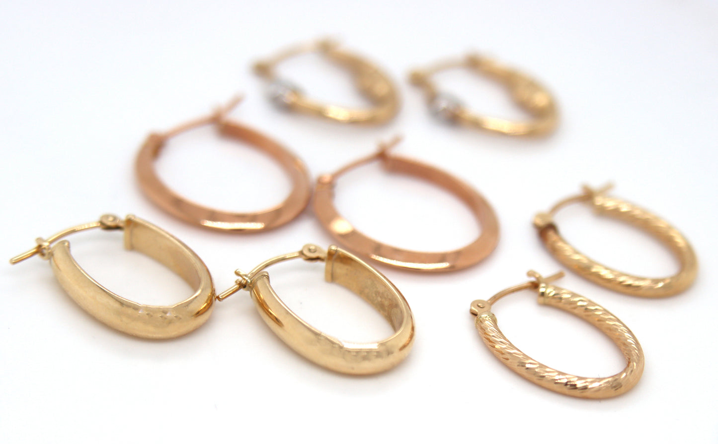 4 Pairs of 14kt yellow gold hoop earrings