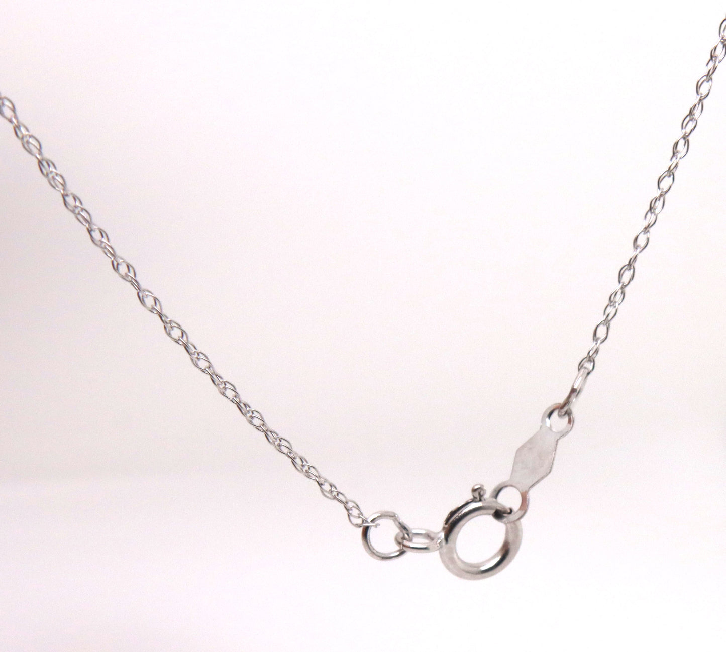10kt White gold oval tanzanite and diamond dragonfly pendant on chain