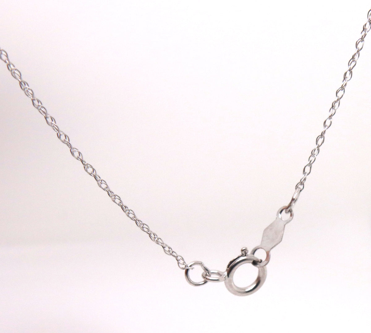 10kt White gold oval tanzanite and diamond dragonfly pendant on chain