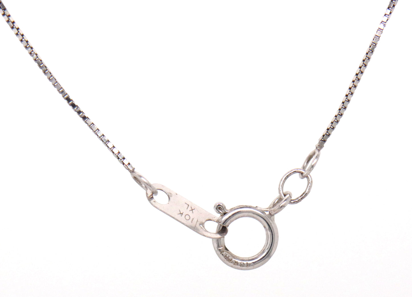 10kt White gold blue sapphire and diamond pendant on chain