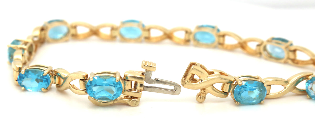 14kt Yellow gold oval blue topaz bracelet