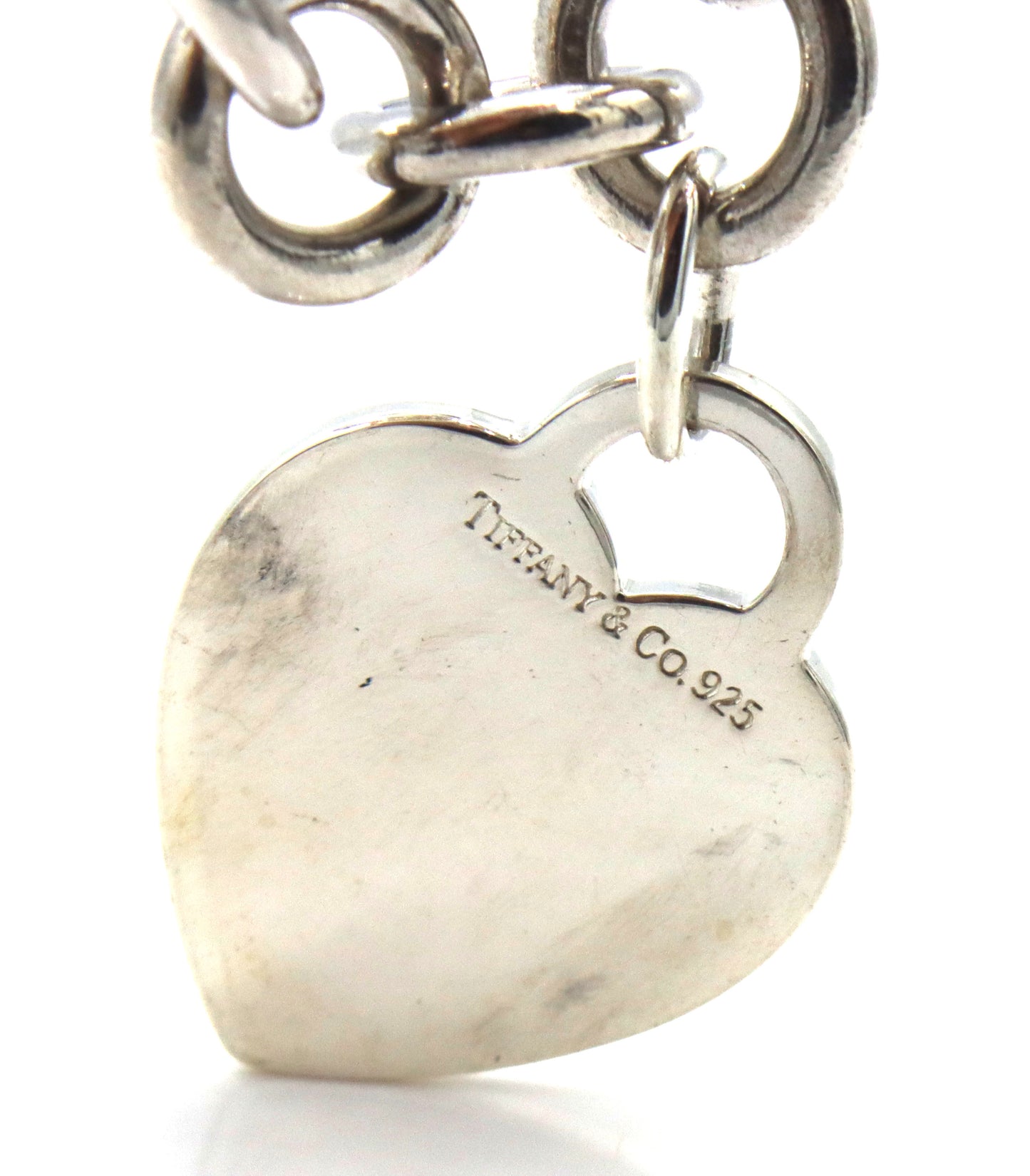 Tiffany & Co link bracelet with heart shaped charm