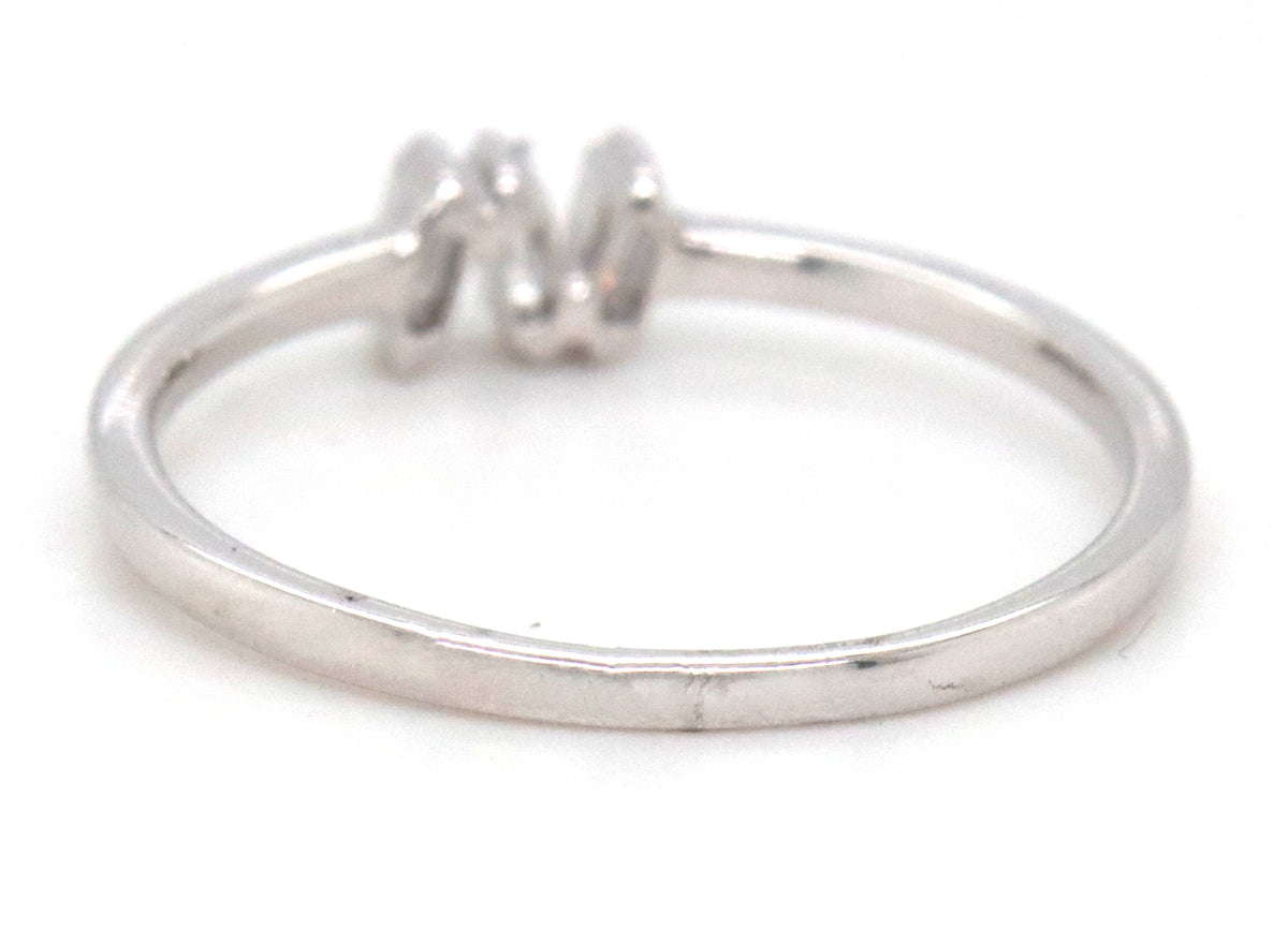 14kt White gold 0.10ctw baguette stackable ring
