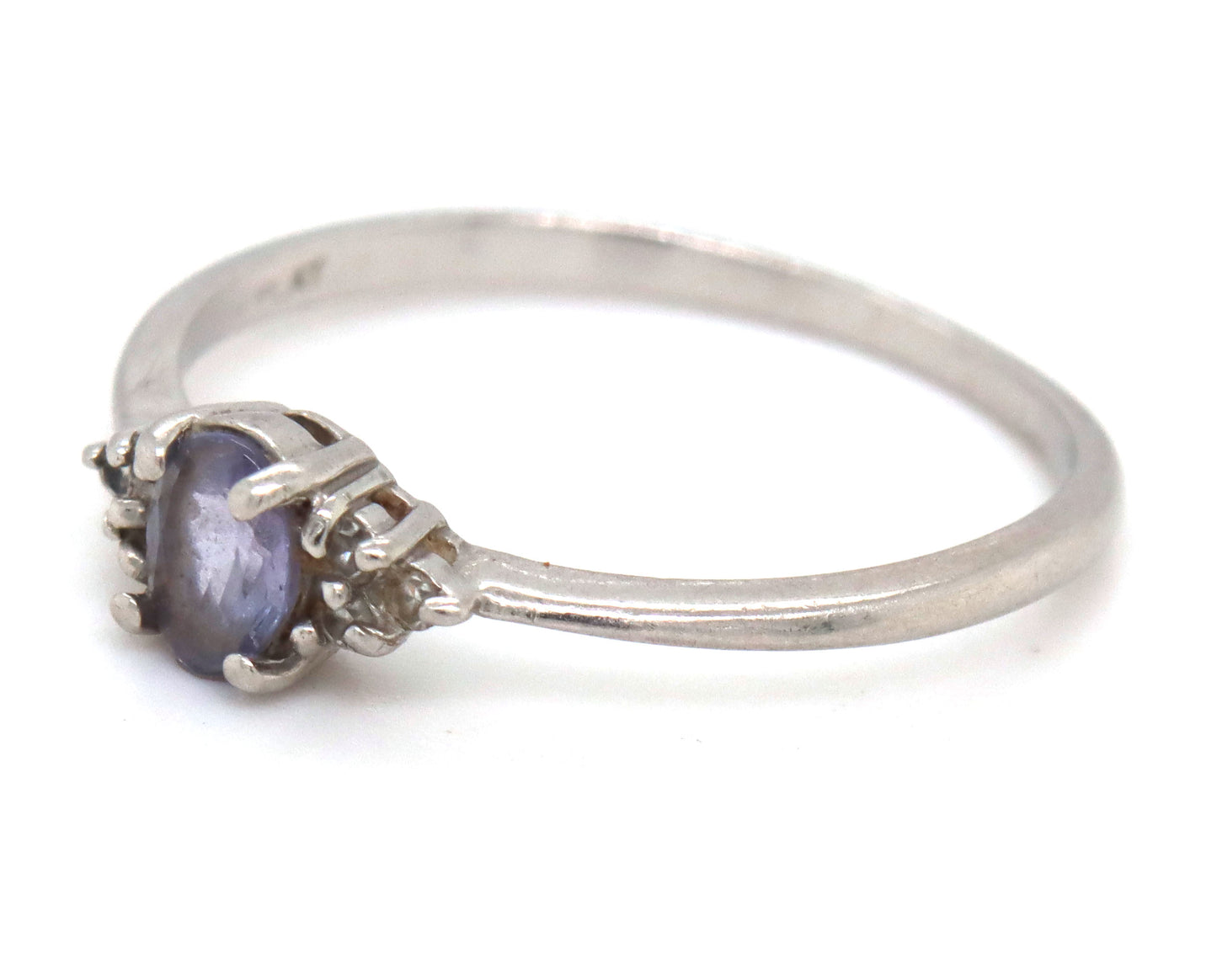 Platinum oval blue star and diamond ring