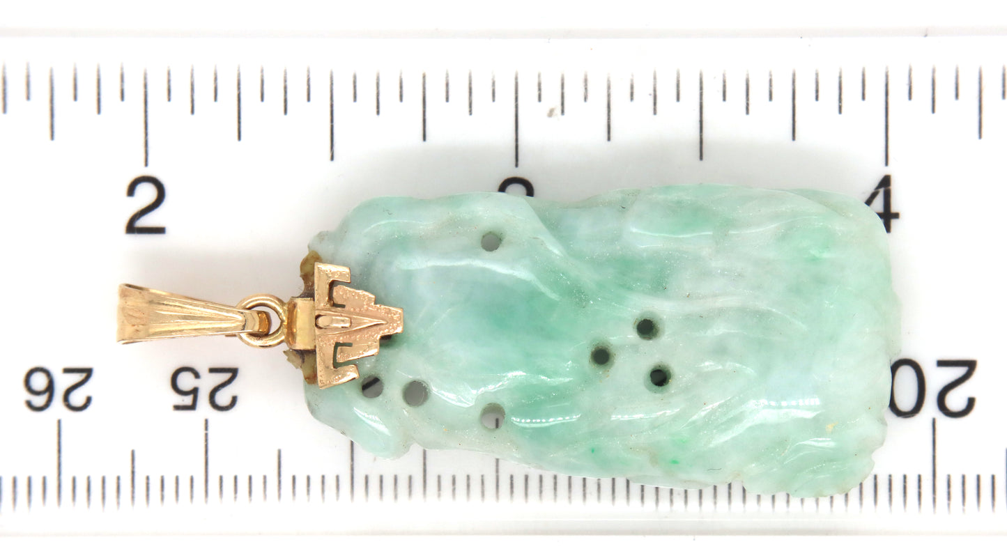 Hand carved green Jade pendant in 14kt yellow gold