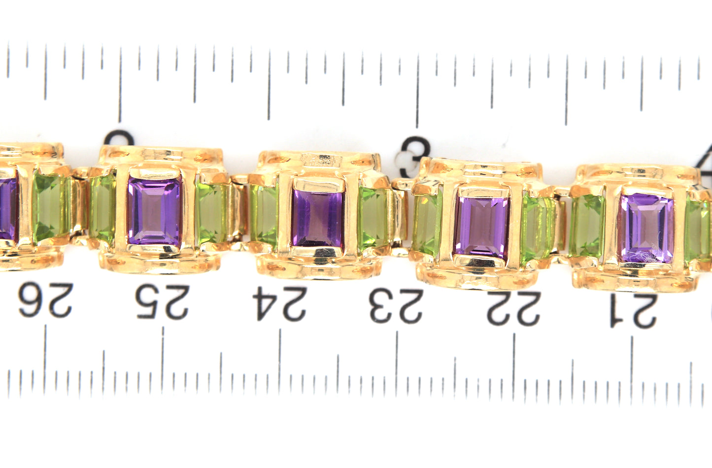 14kt Yellow gold peridot and amethyst link bracelet