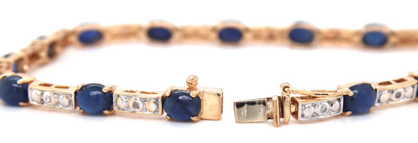14kt Yellow gold 7.5ctw oval sapphire and diamond accent tennis bracelet