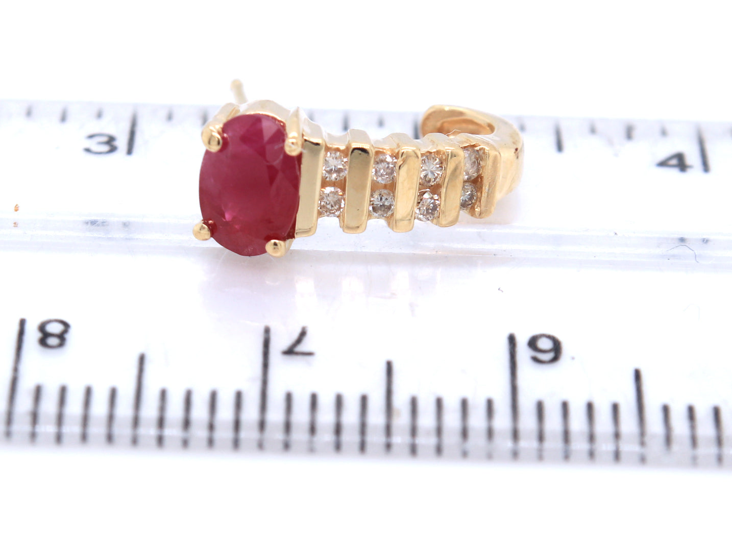 14kt Yellow gold oval ruby and diamond accent earrings