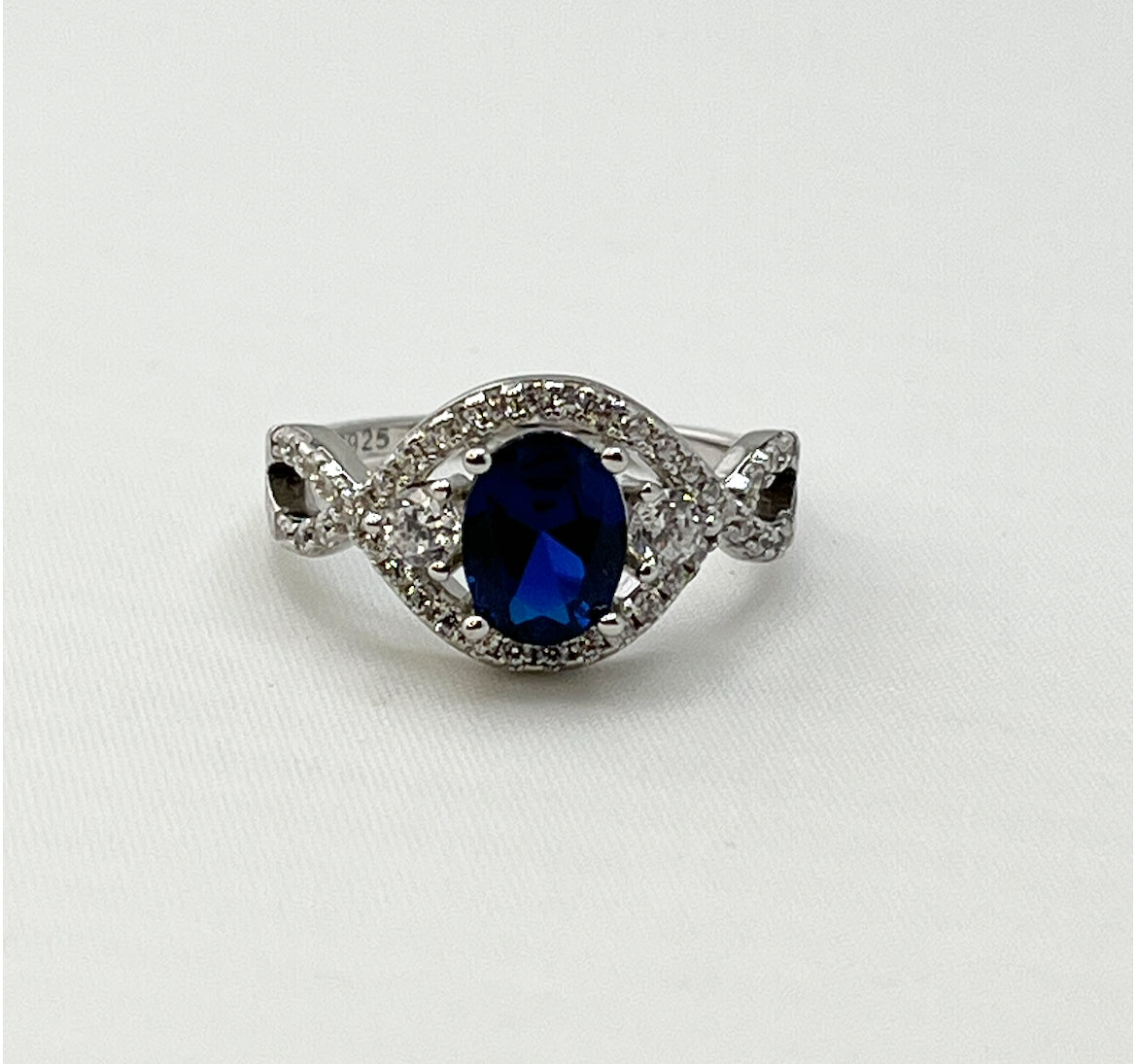 925 Sterling Silver Oval Blue Center Stone With Crystal Pave Details Ring