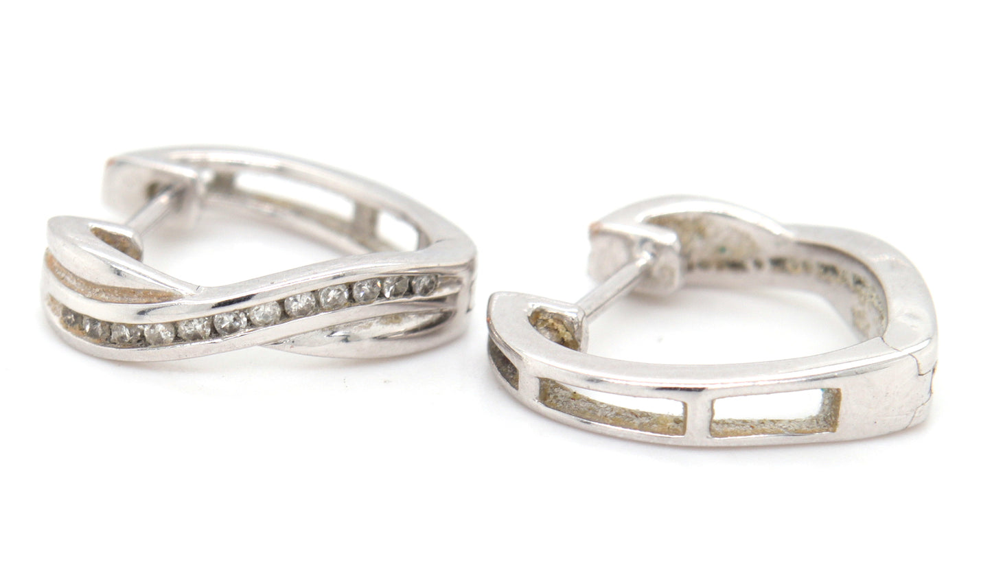 10kt White gold diamond crossover hoop earrings