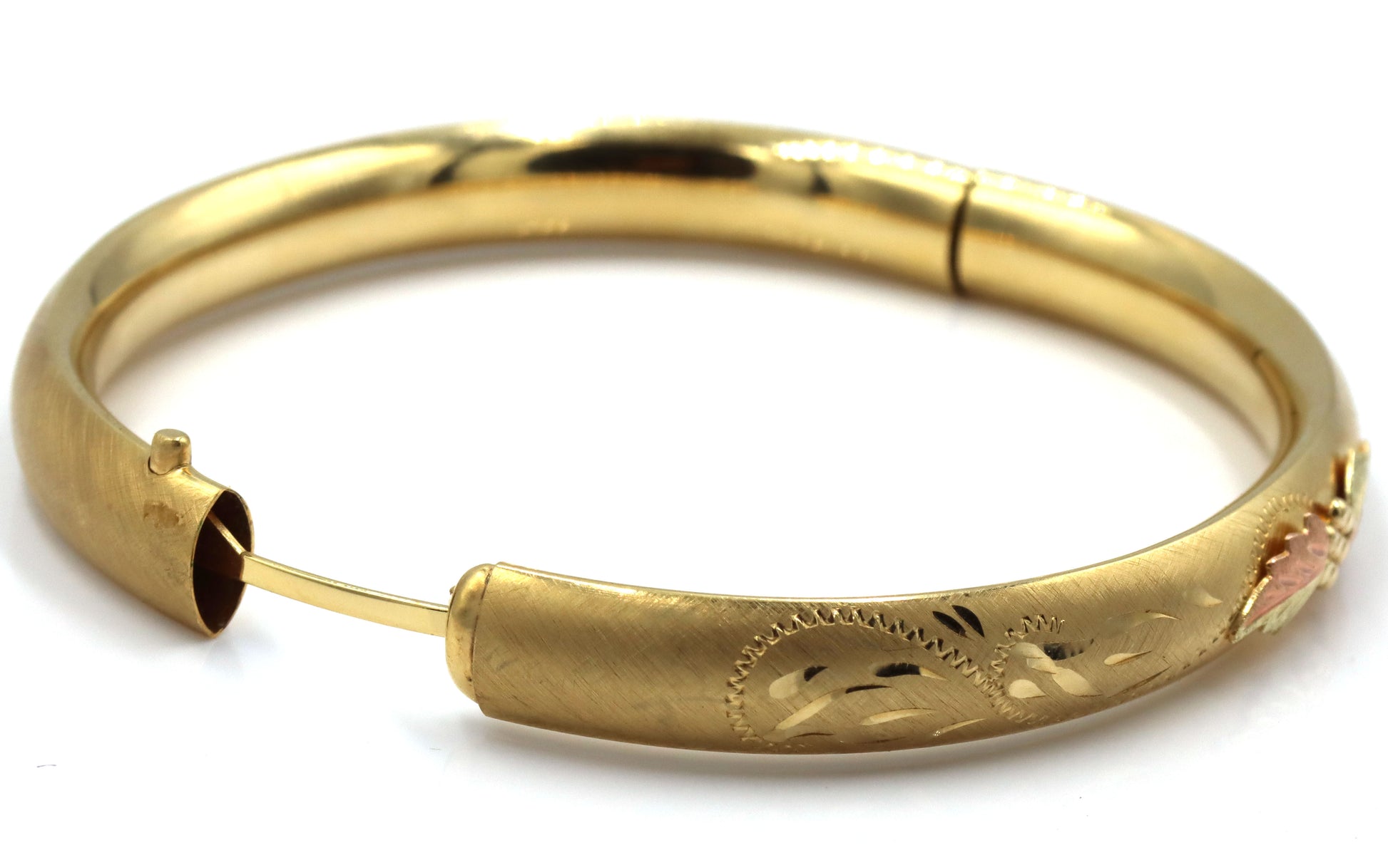 Gold plated flower engraved bangle bracelet