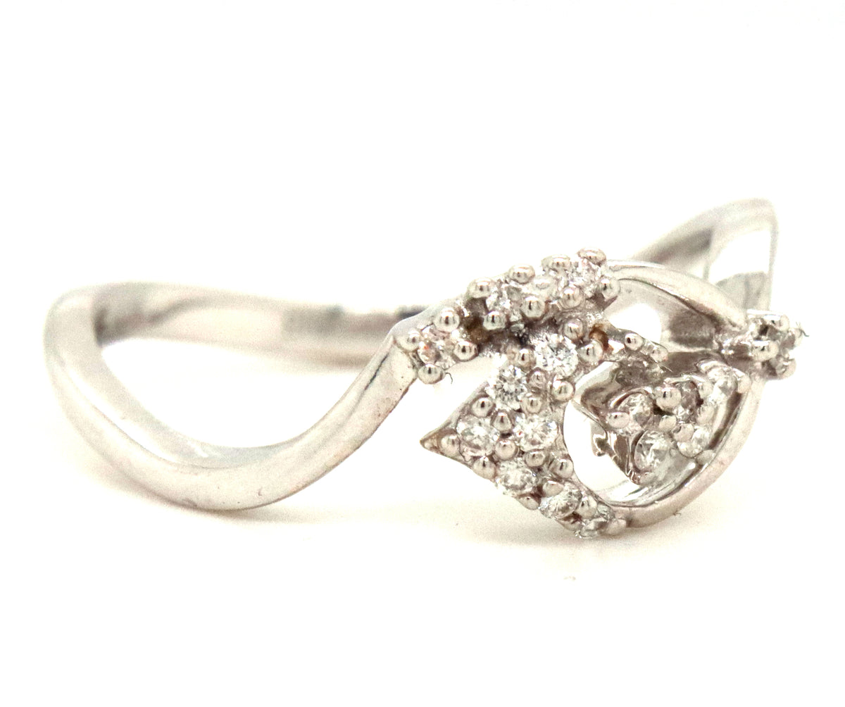 14kt White gold diamond wavy ring
