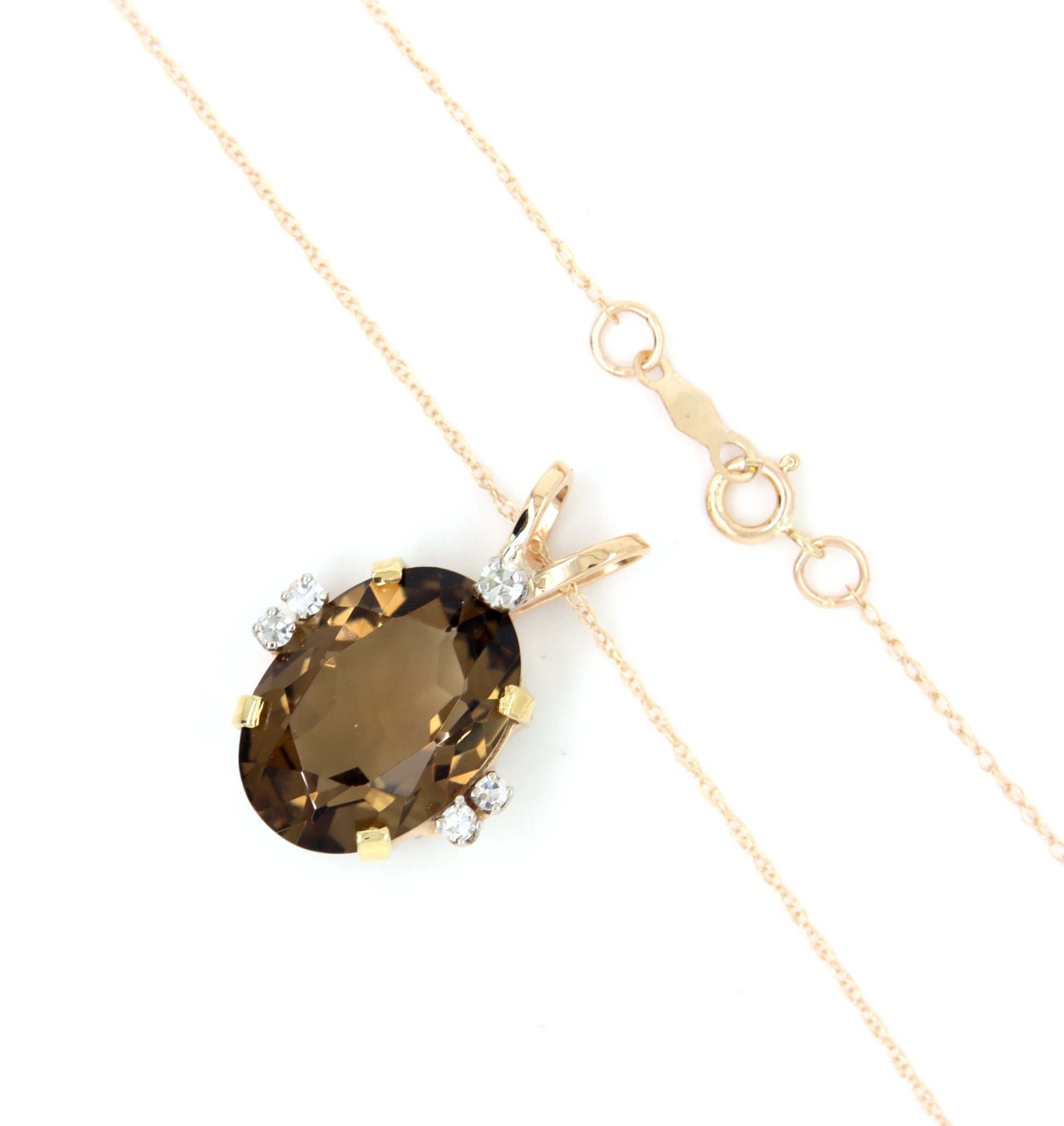 14kt Yellow gold Oval smokey quartz and diamond pendant on chain