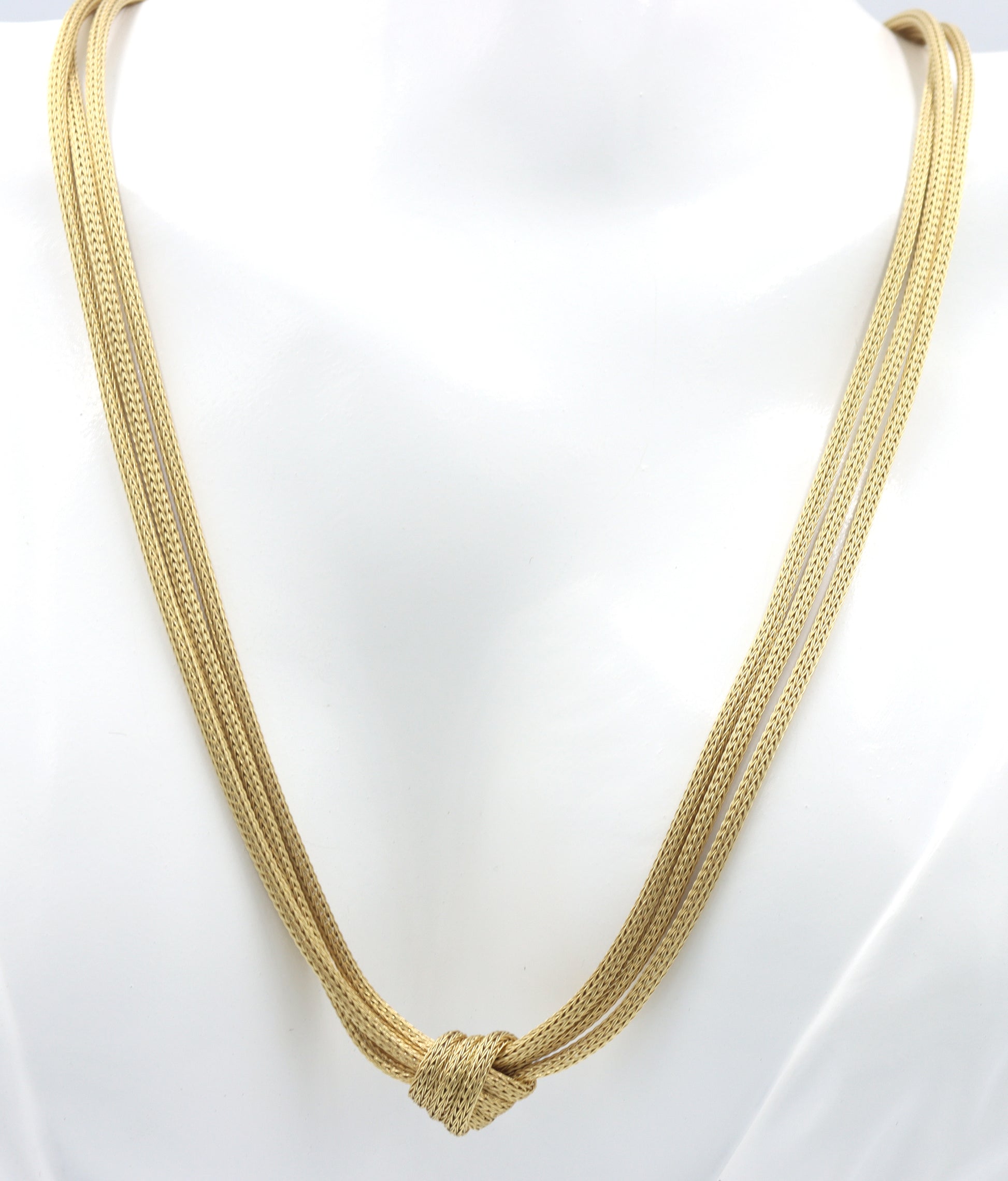 18kt Yellow gold knot pendant on 3 row chain necklace