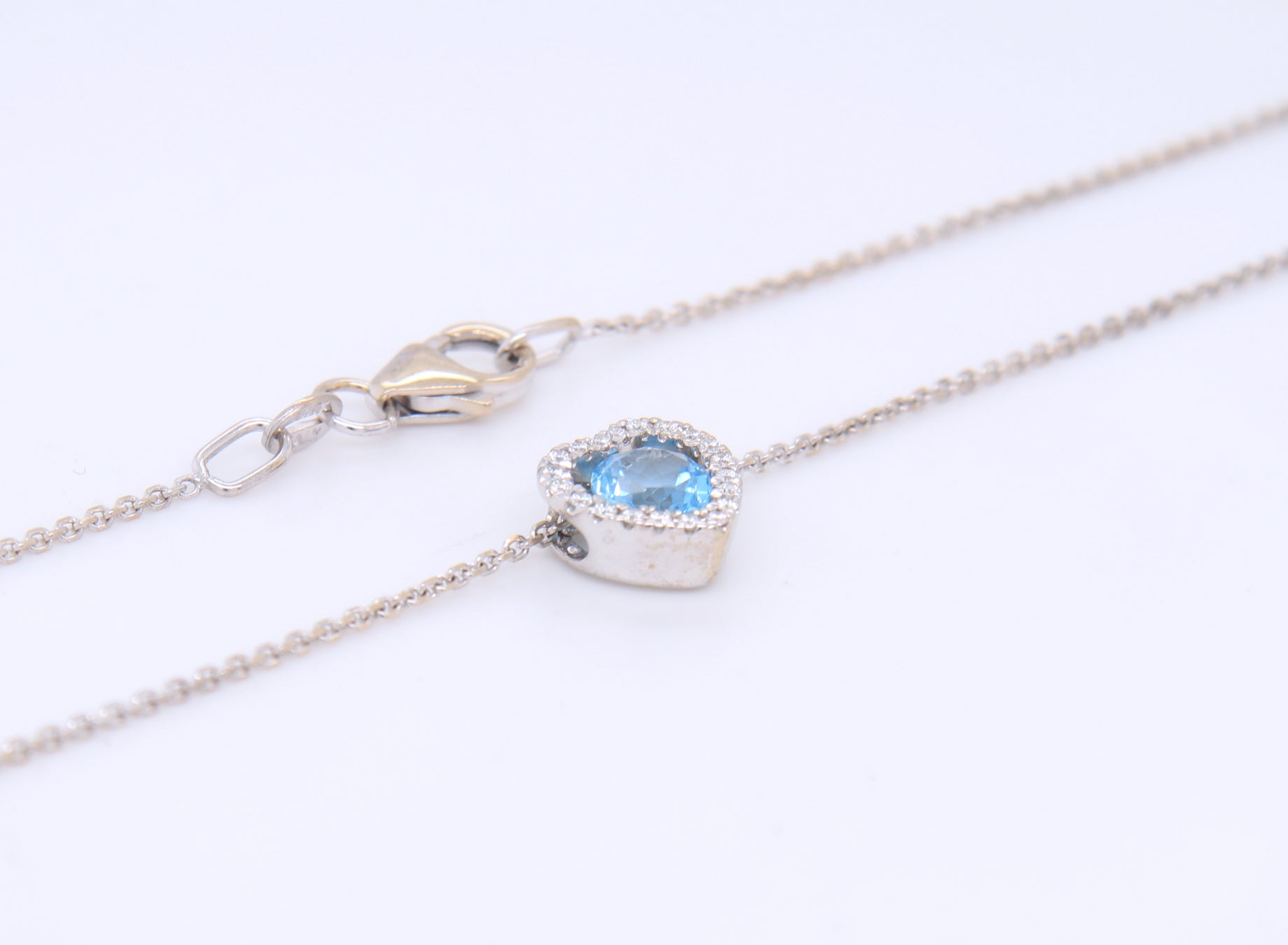 Gorgeous White Gold Blue Topaz and Diamond Pendant on Chain