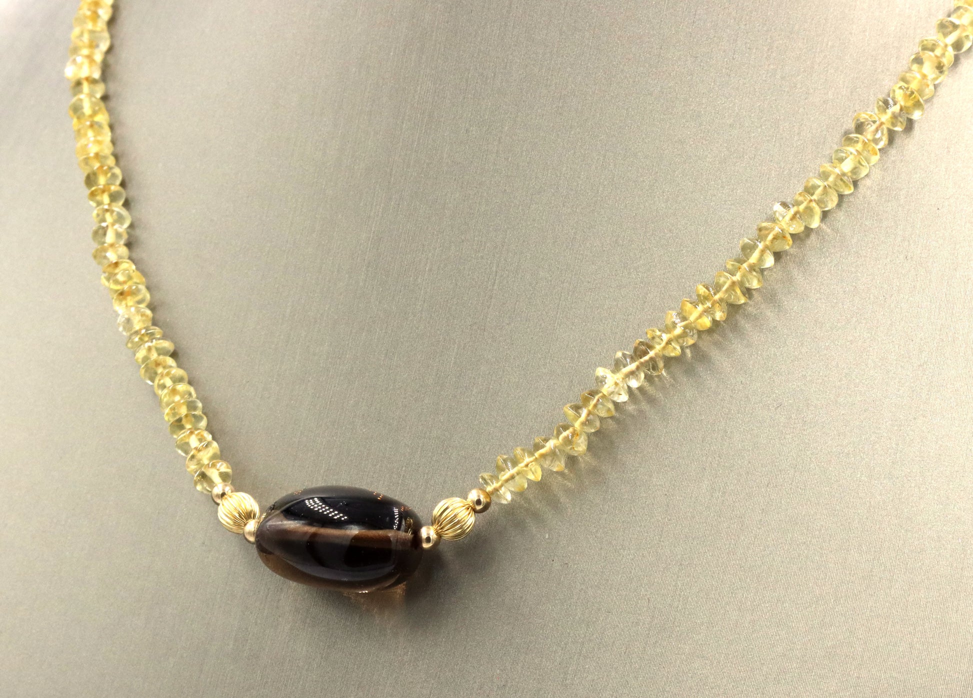 Smokey quartz pendant on citirne beaded necklace with 14kt yellow gold clasp