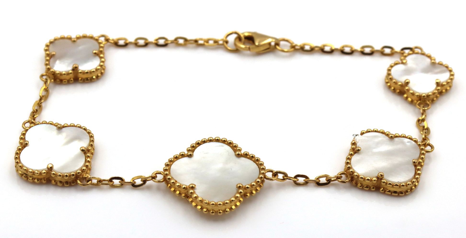 Set of 21kt Yellow gold mother of pearl bracelet and earrings