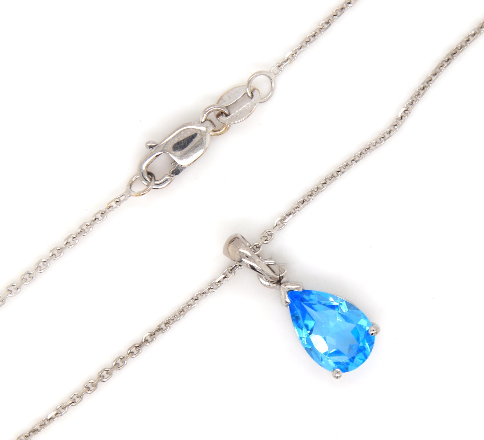14kt White gold pear shaped blue topaz pendant on chain necklace