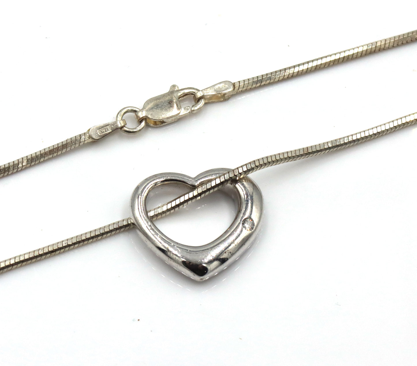 Set of 925 sterling silver 2 necklaces and 2 pair of earrings