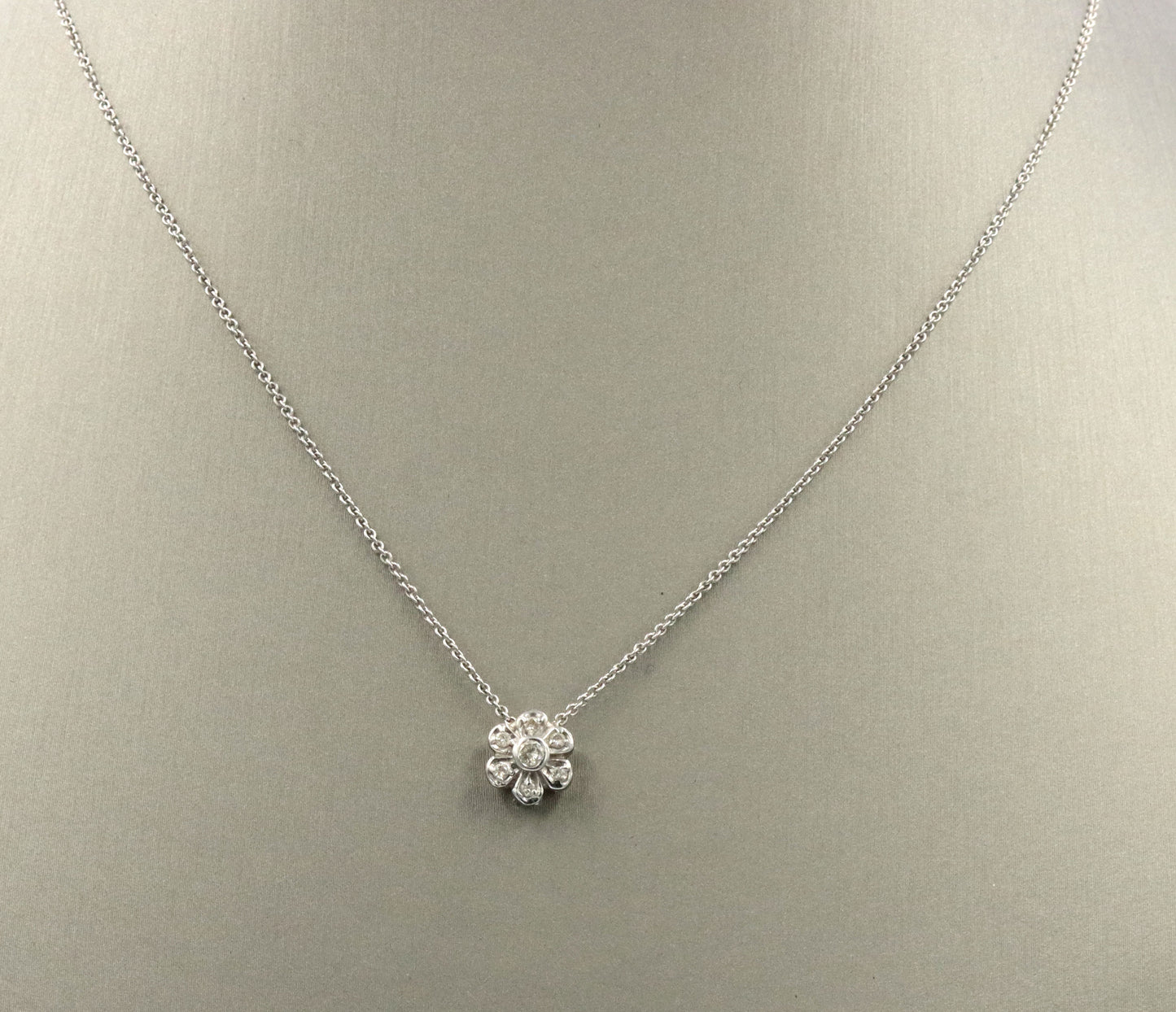 14kt White gold diamond flower style pendant on chain