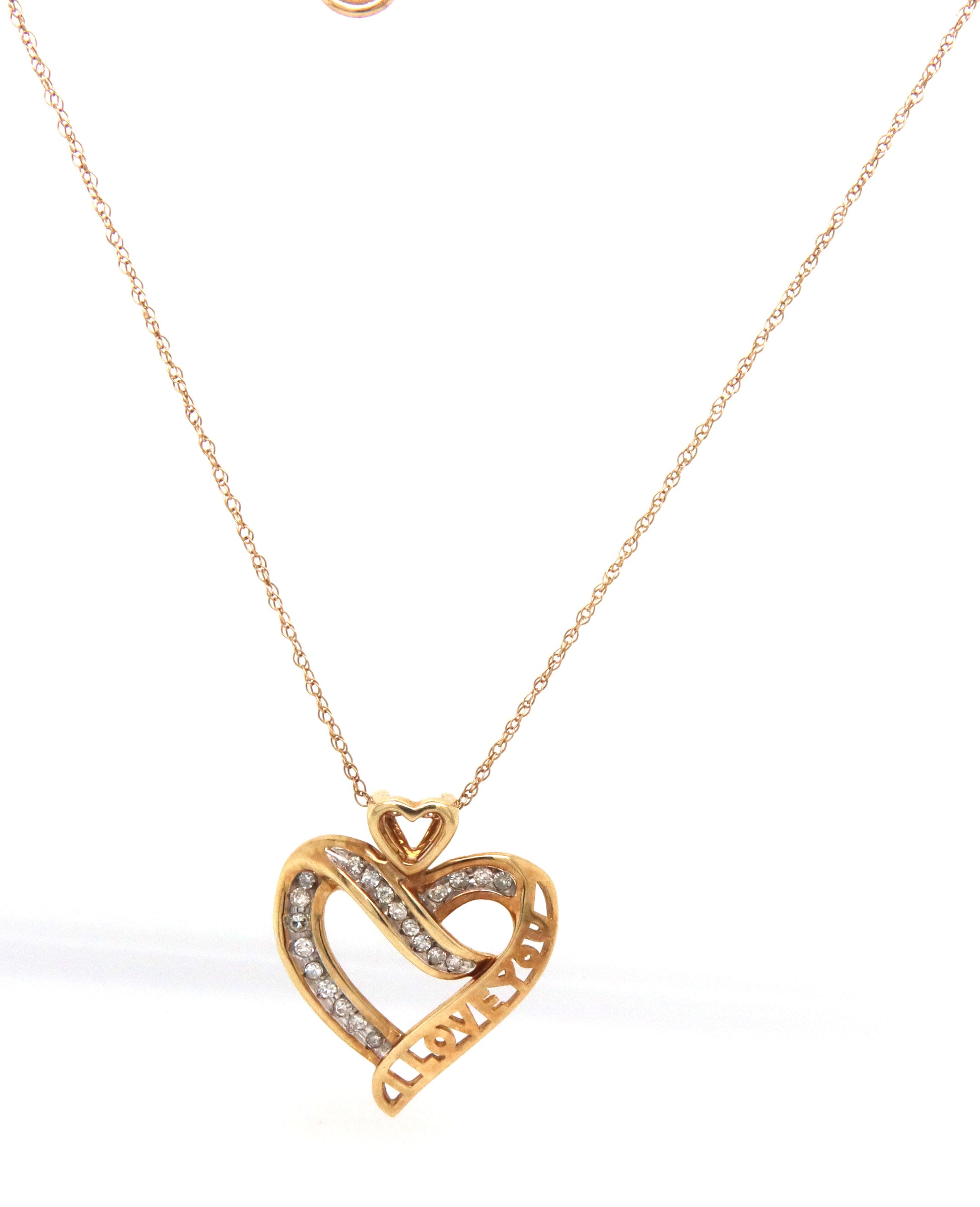 10kt Yellow gold heart shaped diamond pendant on chain