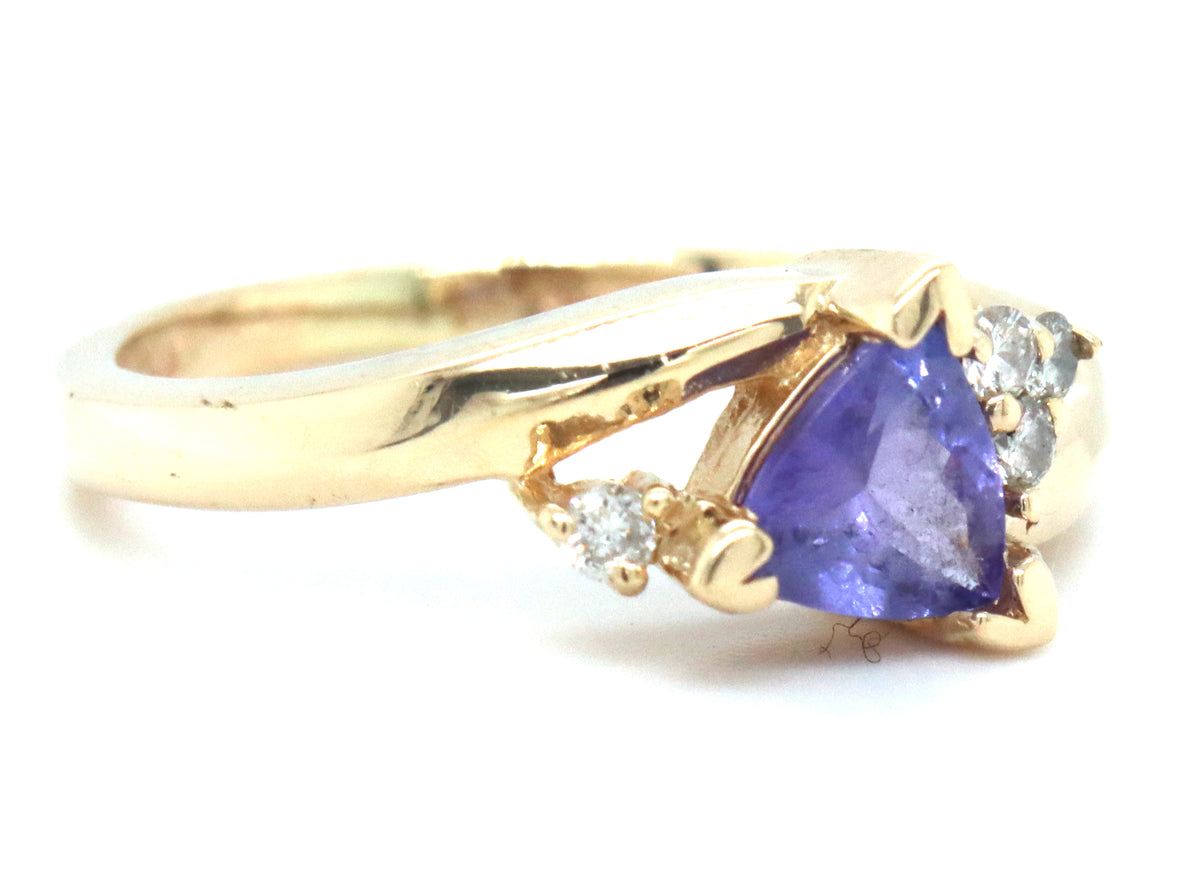 14kt Yellow gold trillion Tanzanite and diamond accent bypass ring