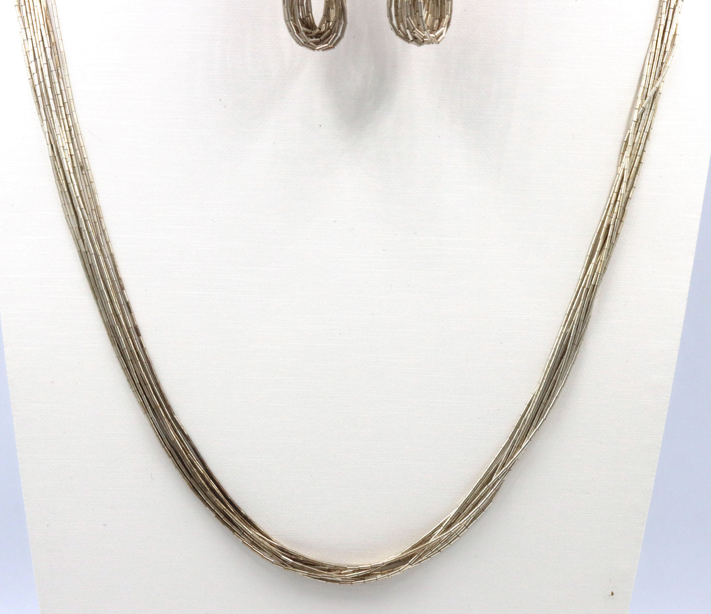 Set of Vintage 925 sterling silver multi strand necklace, bracelet and dangle earrings