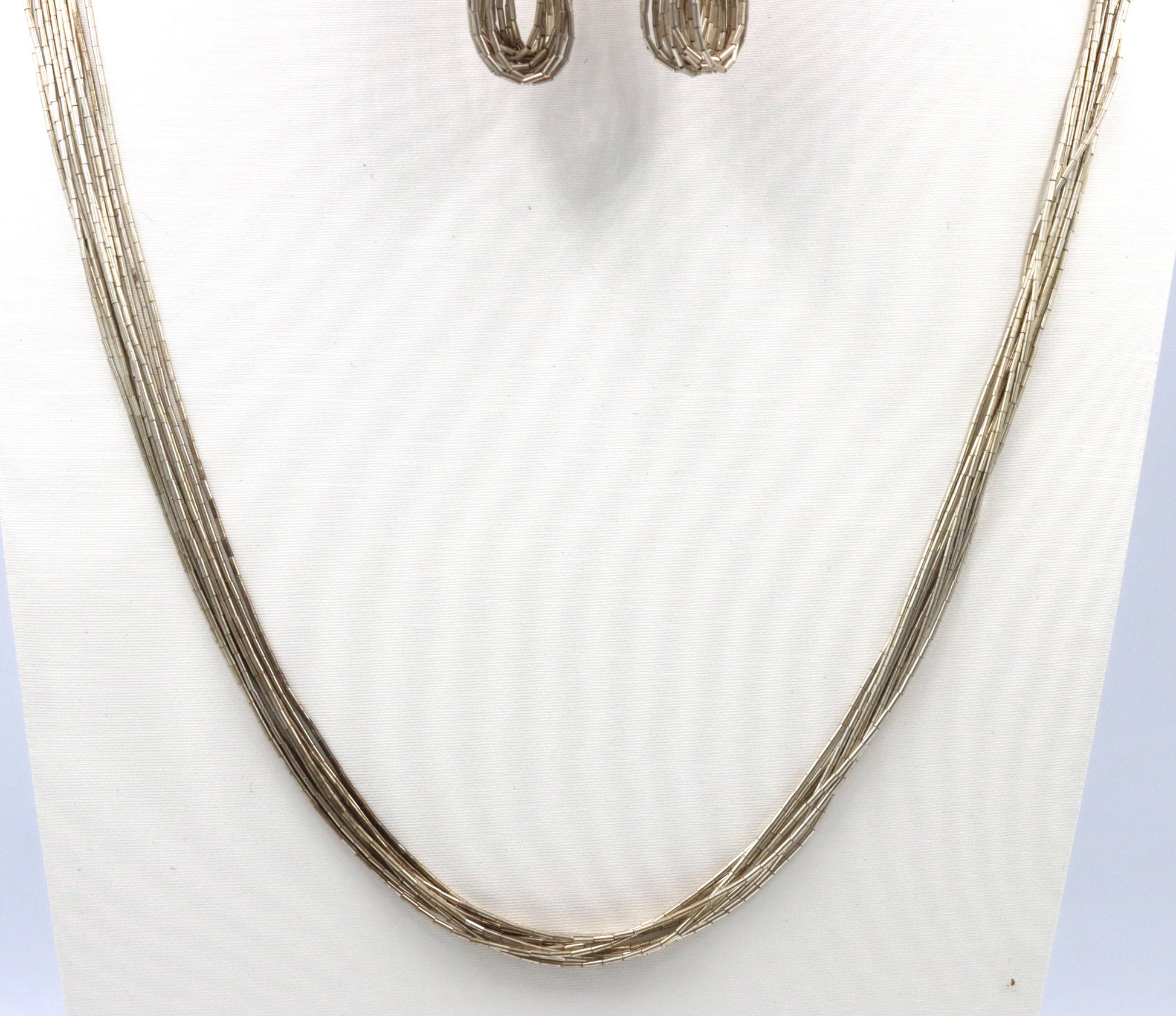 Set of Vintage 925 sterling silver multi strand necklace, bracelet and dangle earrings