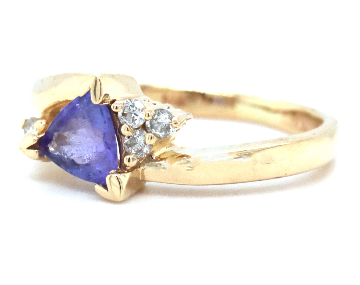 14kt Yellow gold trillion Tanzanite and diamond accent bypass ring