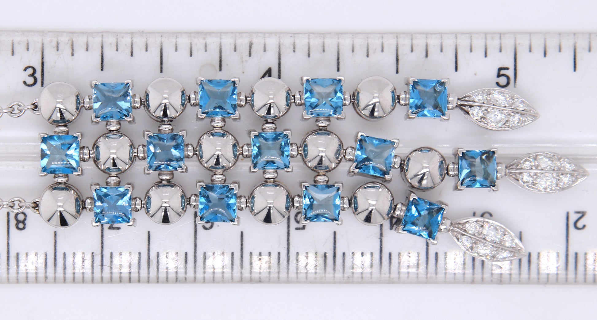 Bvlgari 3 row Drop necklace 18kt with blue topaz and diamonds