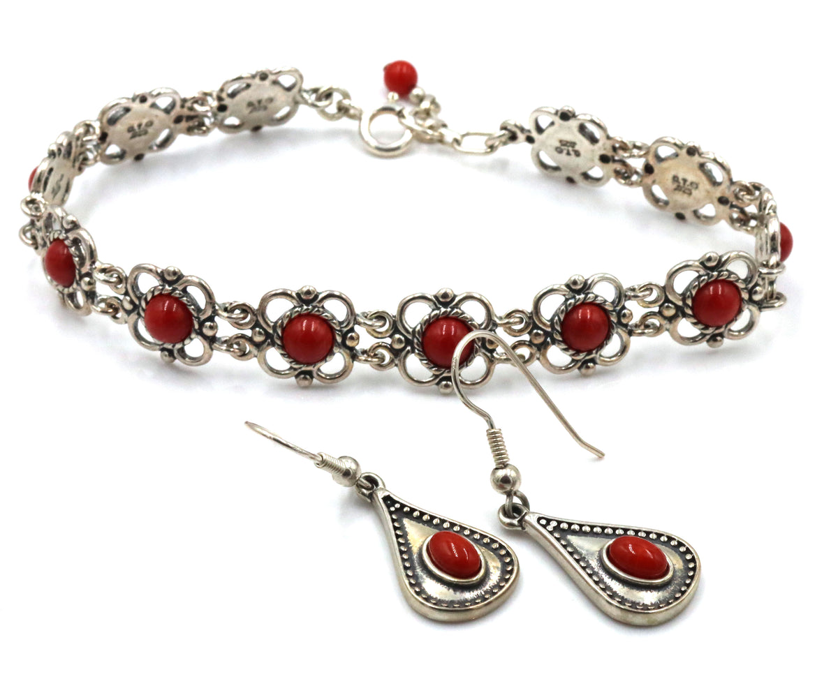 Set of 925 sterling silver signed gemstone bracelet and dangle earrings